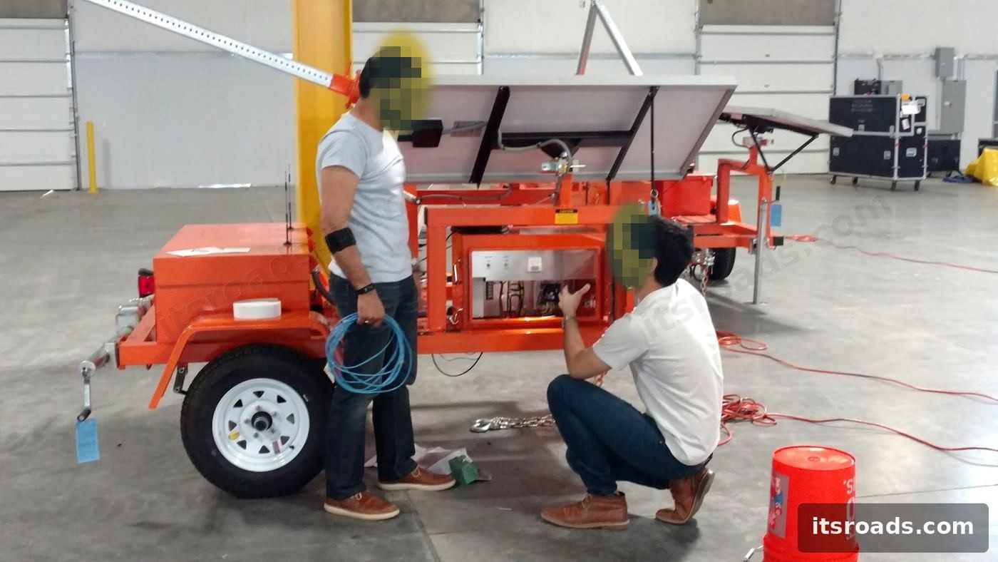 Solar-powered mobile roadside trailer being built in the ITS Roads lab